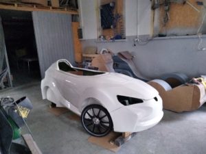 front wheels attached to the velomobile body