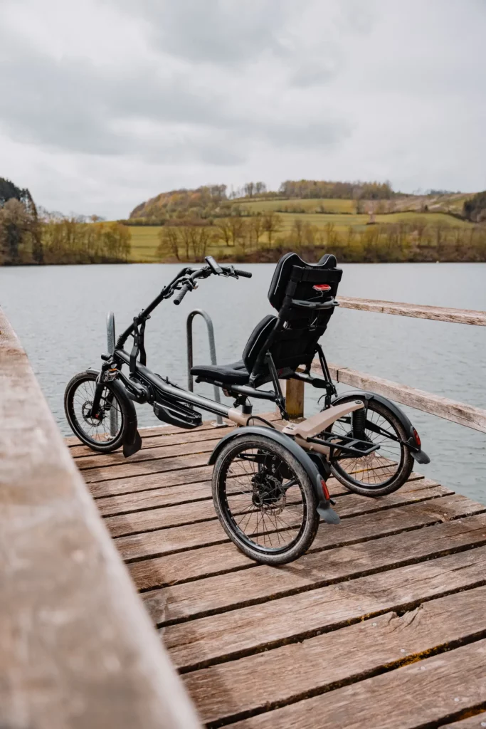 The delta trike with above-seat steering at the lake side